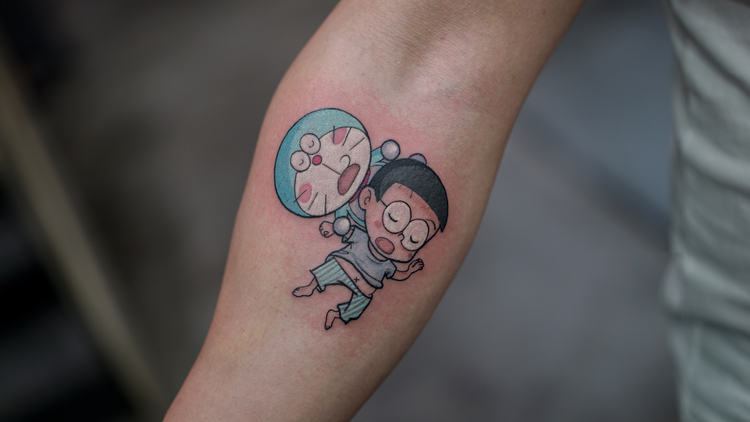 Hình xăm Doraemon và Nobita