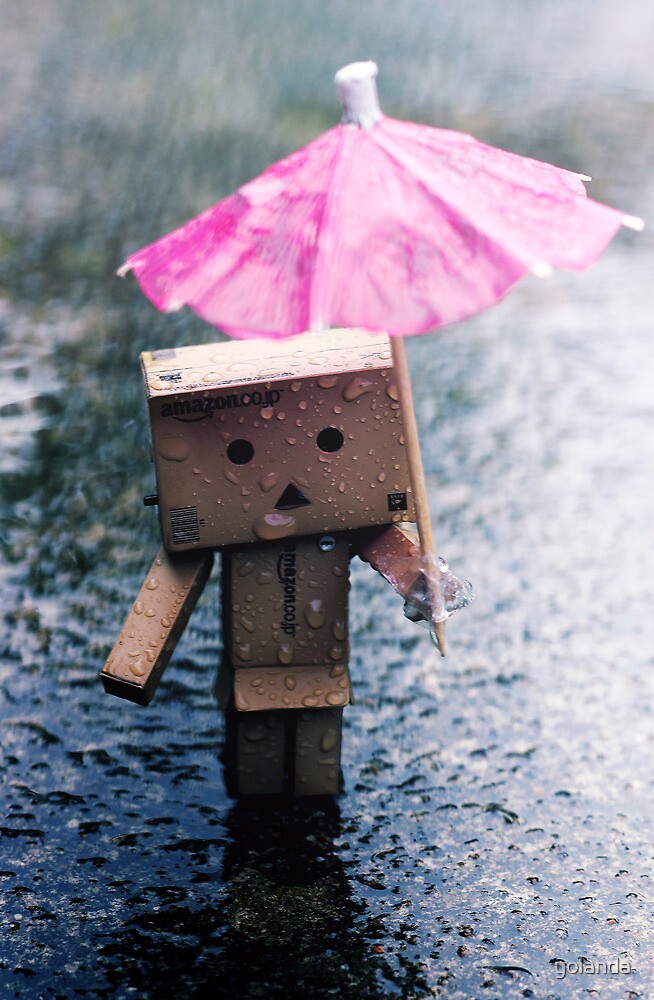 Ảnh người gỗ buồn trong mưa
