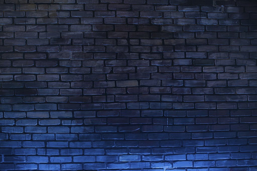 Mẫu background tường gạch xanh đen