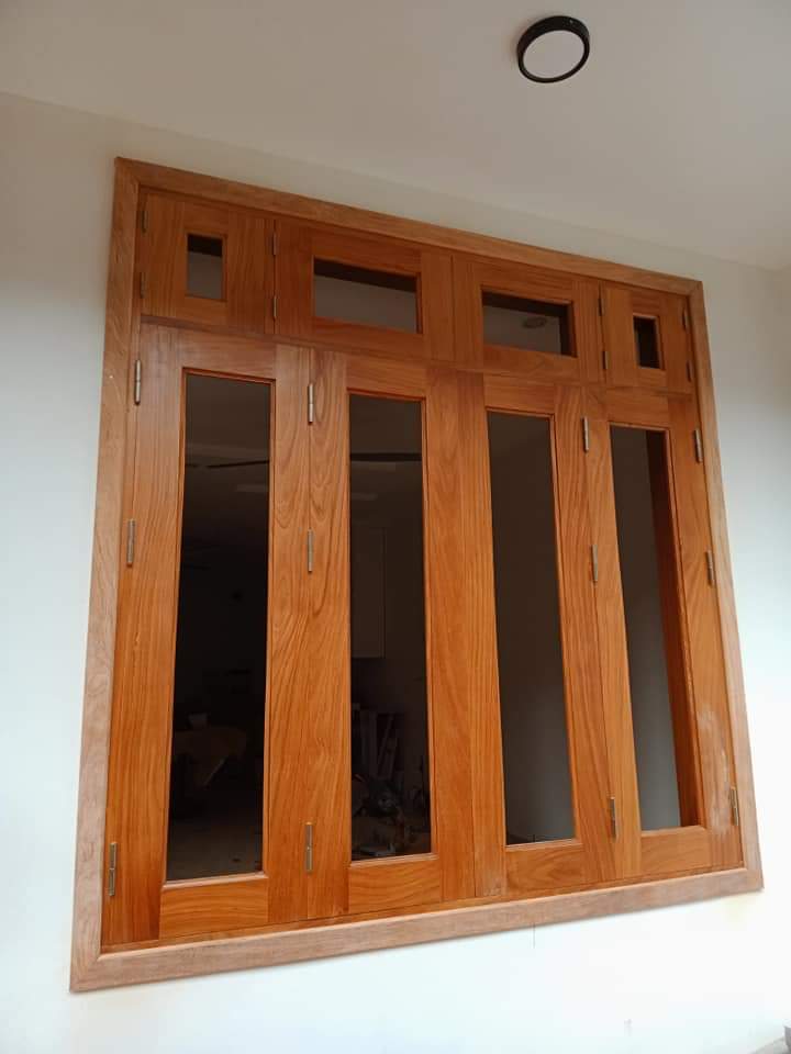 Mẫu cửa gỗ kính cường lực 4 cánh