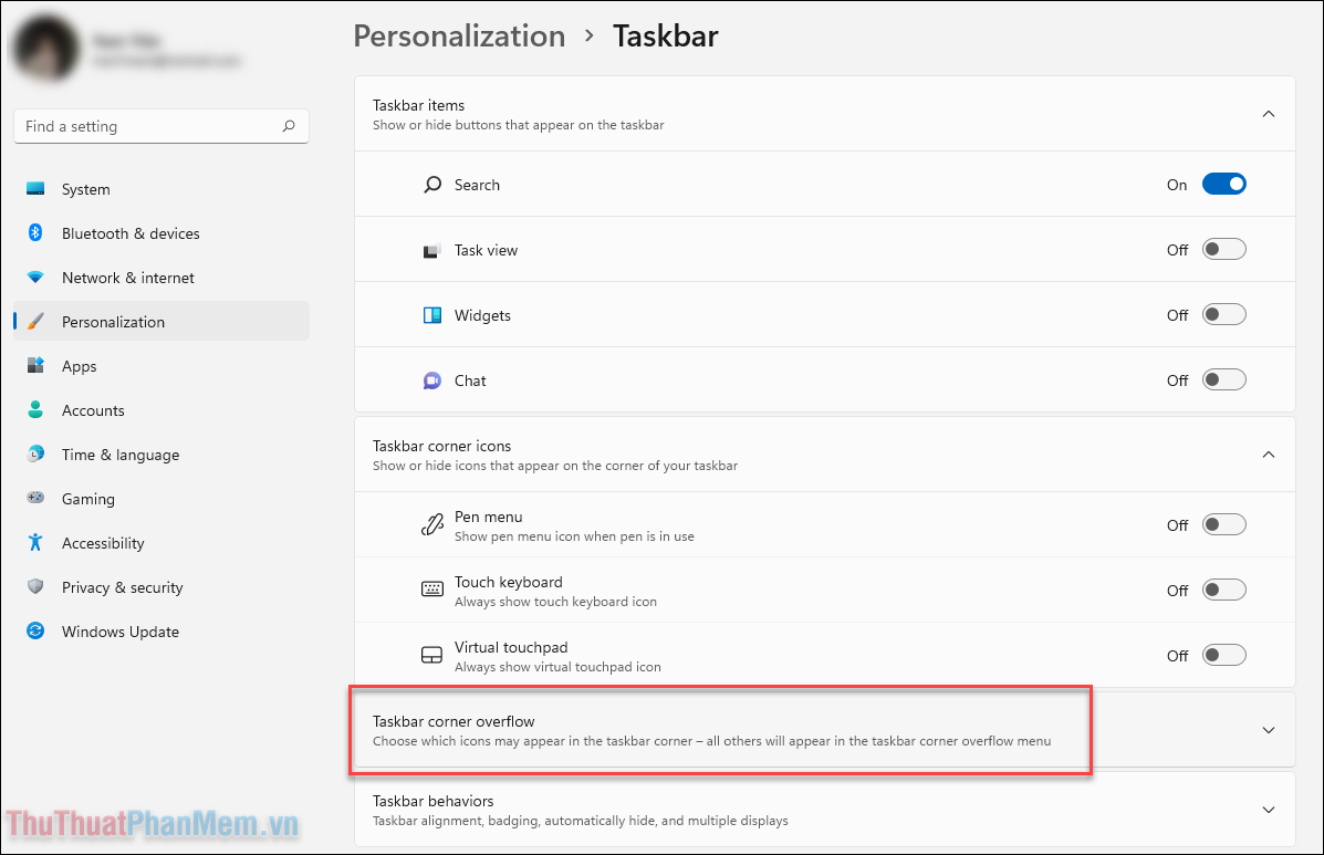 Nhấn vào mục Taskbar corner overflow